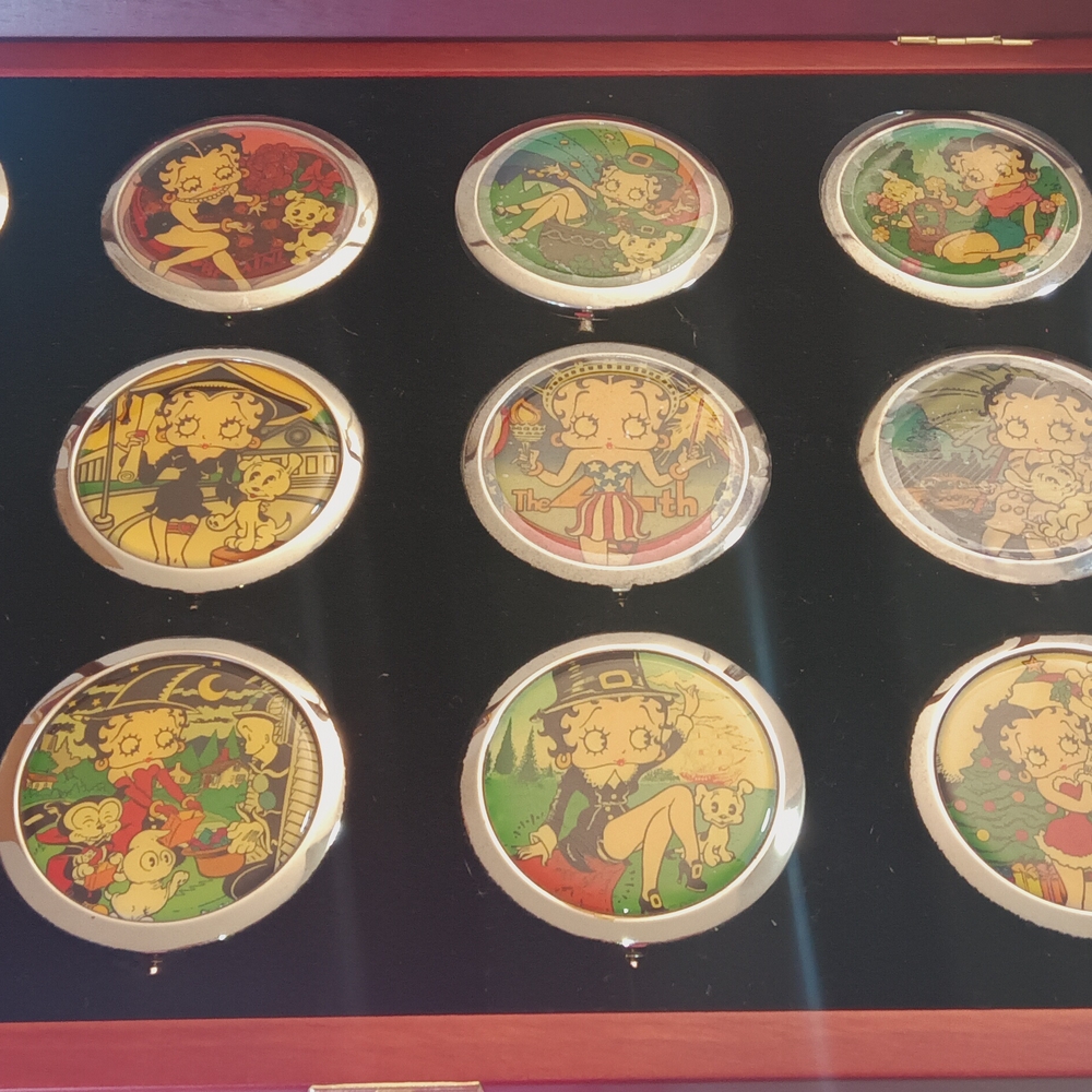 Betty Boop Compact Collection with Red and Gold Accents